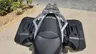 Parte trasera de Honda NC750X negra con maletas laterales y parrilla