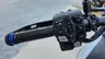 Piña izquierda de Honda Africa Twin con controles de función, intermitentes, bocina, luz larga y botón de función