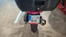 Parte trasera de una moto Honda PCX 125 con matrícula y maleta