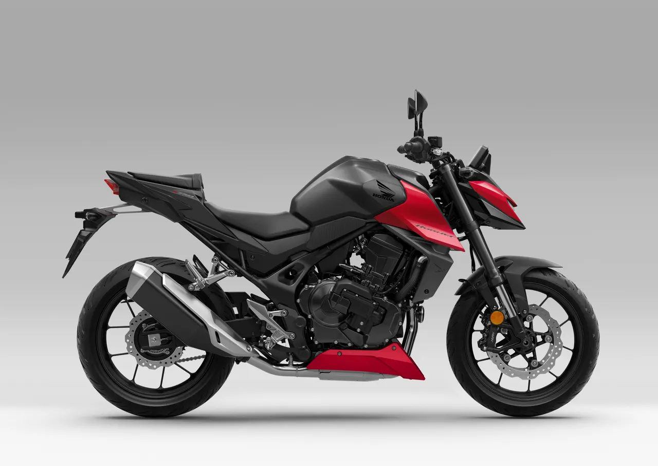 Honda CB750 2027 roja y negra vista lateral