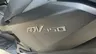 Insignia ADV 350 de una moto Honda en color negro mate