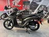 Scooter Honda Vision 110 color marrón metálico mate
