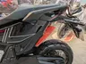 Vista trasera de una moto Honda X-ADV negra