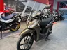 Scooter Honda Vision 110 marrón metálico en exposición