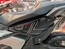 Detalle lateral de una moto Honda X-ADV 750 negra