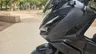 Honda ADV 350 negra mate de perfil