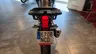Vista trasera de una moto Honda NX500 con matrícula española