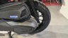 Primer plano del motor y rueda de un scooter Honda con distintivo eSP+