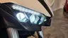Detalle del faro delantero de una moto Honda Hornet 1000