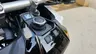 Detalle de la consola de la moto Honda X-ADV con selector de modos y botones