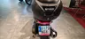 Parte trasera de una moto Honda PCX 125 con baúl Shad y matrícula visible.