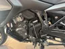 Detalle del motor de una moto Honda