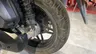 Detalle de la rueda trasera de una Honda Forza 125