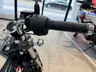 Manillar izquierdo de Honda Dax 125 negro con puño texturizado y detalles cromados.