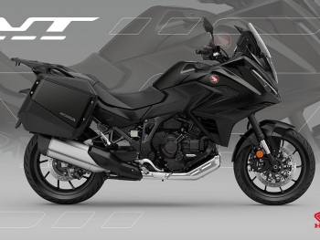la nueva Honda NT1100 2025 Negro Gunmetal Metalizado dispone de un carenado mas afilado y mas limpio gracias a que incorpora los intermitentes en el faro delantero. toda la iluminacion es led